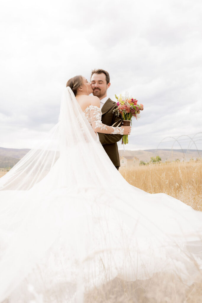 Kensey kissing Spencer