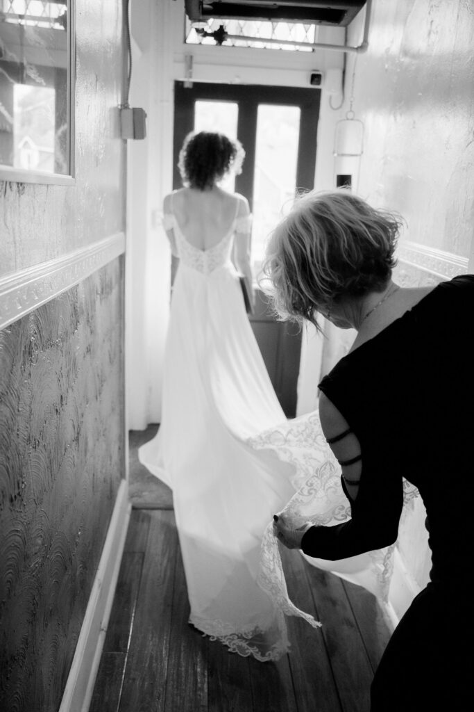 Michelle's mother holding her Gown