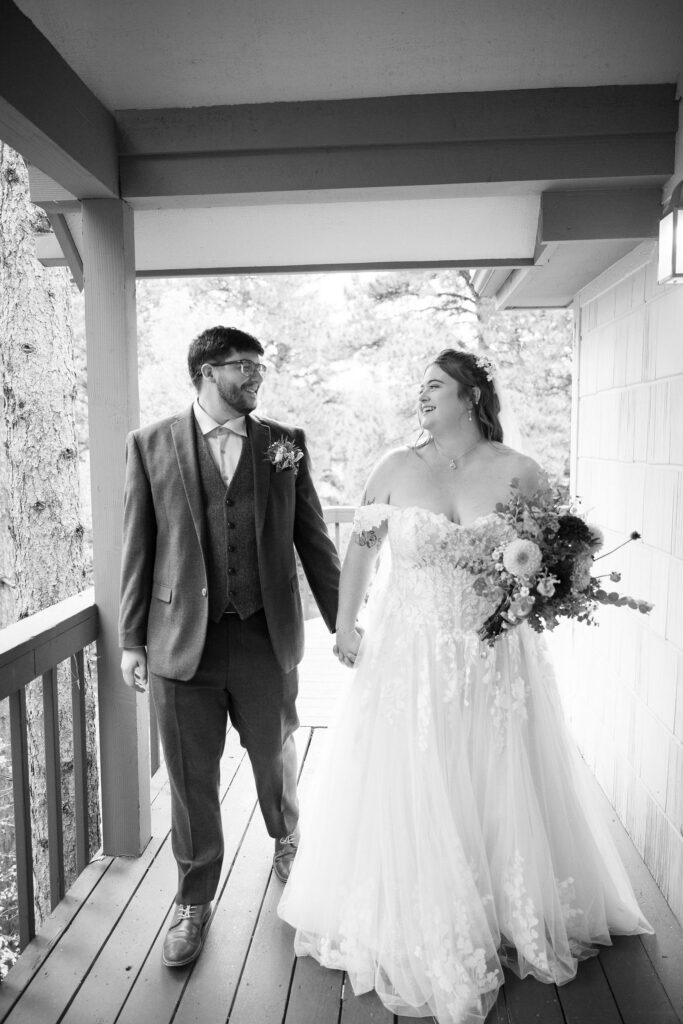 Olivia and Andrew walking together and holding hands