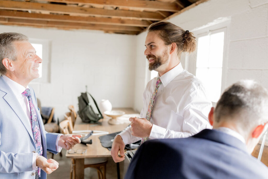 Spencer and his groomsmen shared easy smiles
