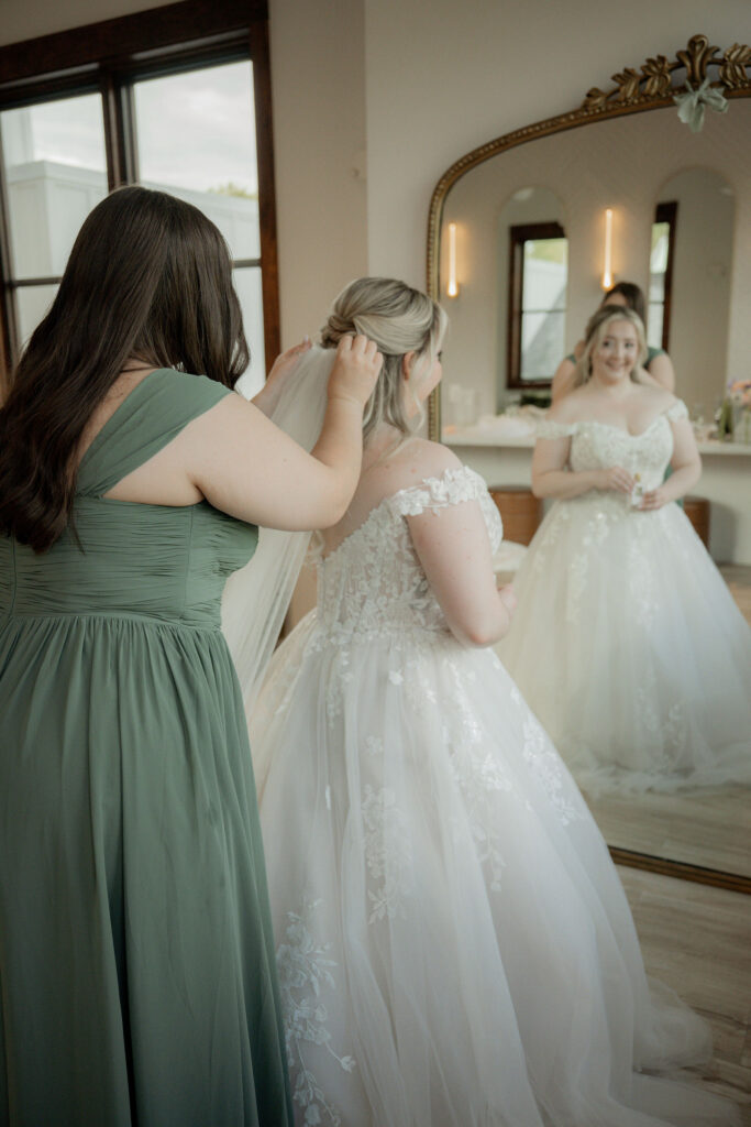 bridesmaids helping Janelle getting ready