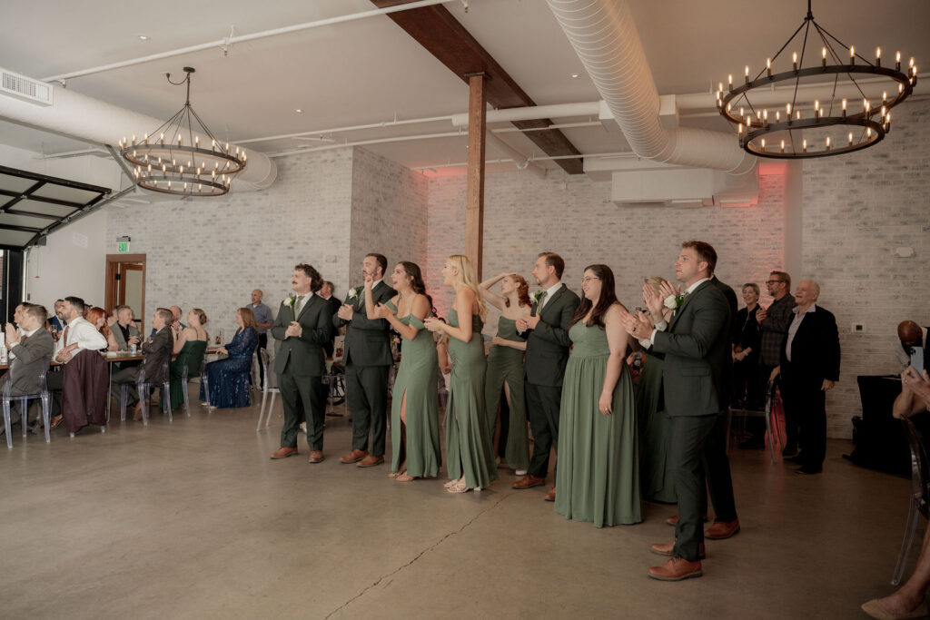 friends and family gathered around to watch